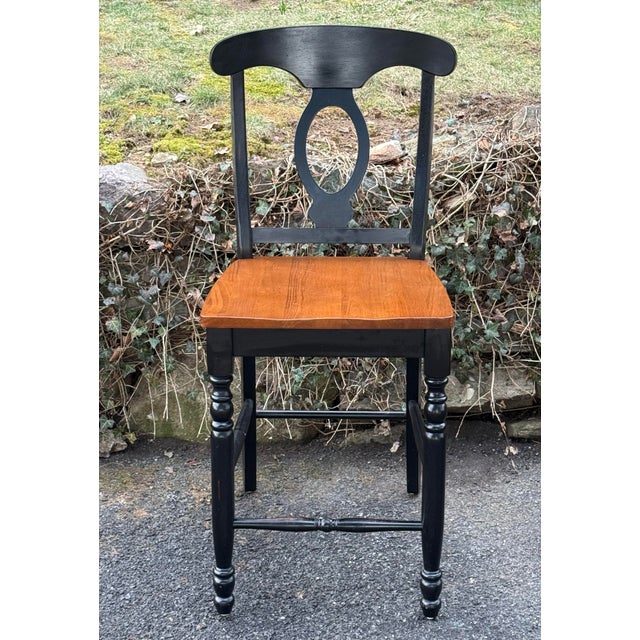 Beautiful set of 4 farmhouse style barstools . Features Attractive Napoleon style back ,Comfortable sculpted seats and...