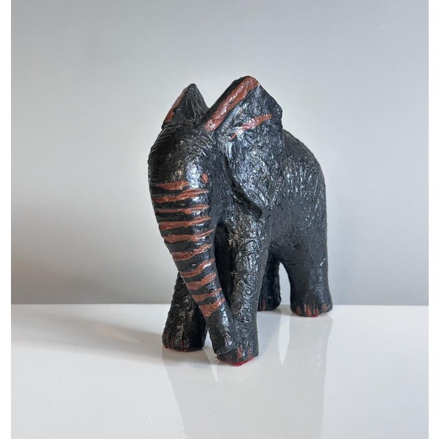 An impressive antique elephant figurine in clay, handcrafted in Germany during the 1920s. Beautifully detailed body,...