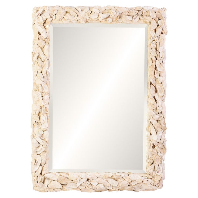 Perfect for coastal decor, this heavily textured Oyster Shell Mirror is crafted with natural oyster shells gathered off...
