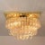 This stylish three-tiered faceted Murano flush mount with 58 clear crystal glass prisms was designed and produced by...