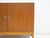 Børge Mogensen sideboard of teak with two doors in the front. Inside with shelves and pullout trays. Please note that the...
