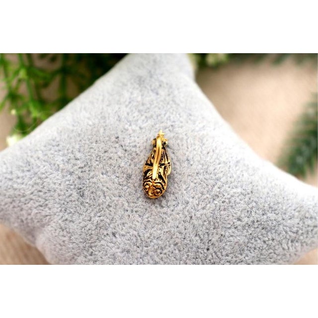 19.2k Gold Our Lady of the Immaculate Conception Pendant, in Worn conditions. Designed 1890 to 1919