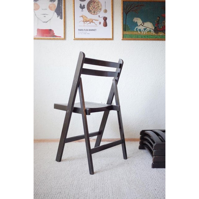 The set consists of 5 black painted vintage folding chairs. In contrast to many other chairs of this kind, they are very...