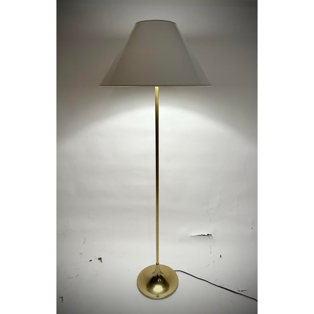 Bring timeless Mid-Century Modern style into your home with this beautiful vintage floor lamp, attributed to Laurel...