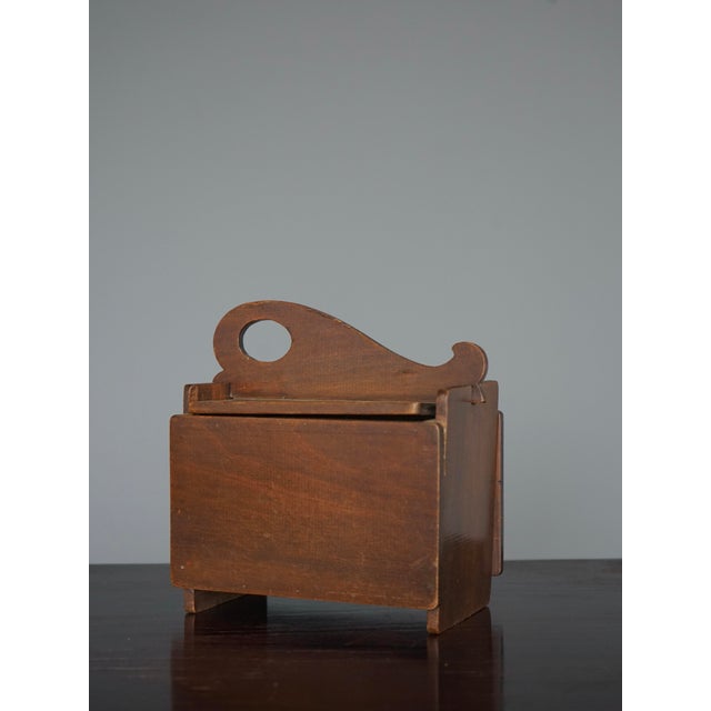 A well designed plywood box or storage container in the the manner of the Dutch 'Amsterdam School'. The lid of the box in...