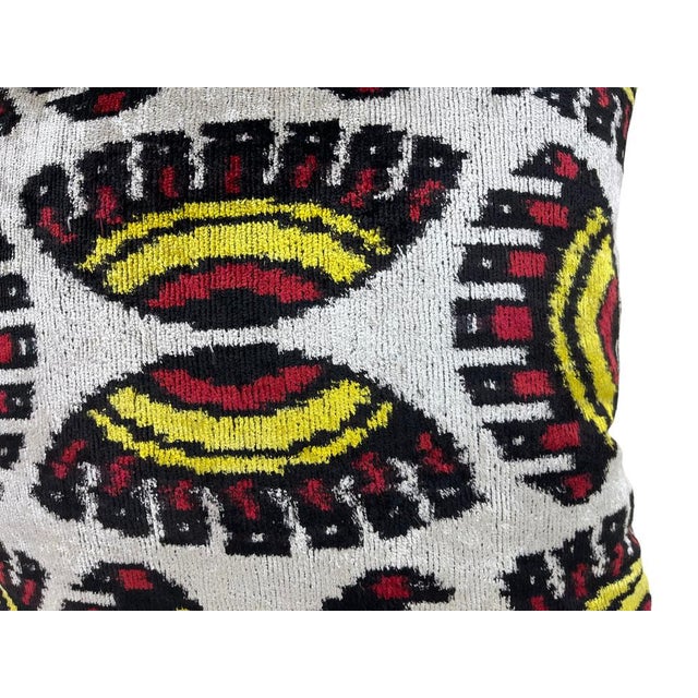 Handmade Velvet Silk IKAT cushion cover with eye design and multicolor. It can be a perfect gift for new homes. This...