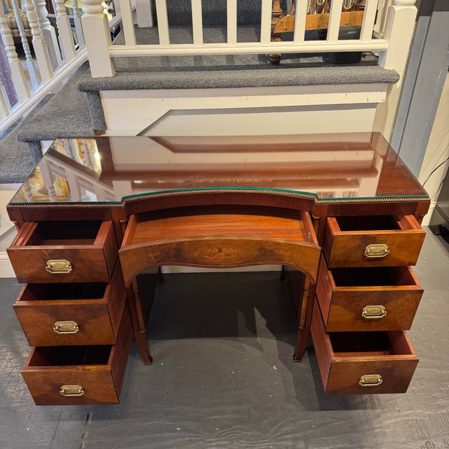 This a 1940s Vintage Berkey and Gay desk. It has seven drawers and wonderful of storage. It has a removable glass top. It...
