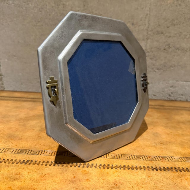 For your consideration, an antique octagonal silver-toned tabletop picture frame, possibly originating from Italy....