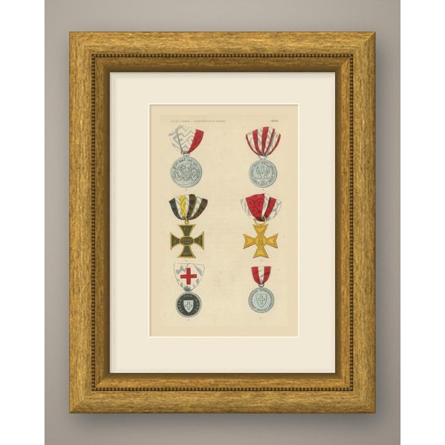 This is an original antique wood engraving, colored by hand with watercolor, showing six medals and crosses. At the top...