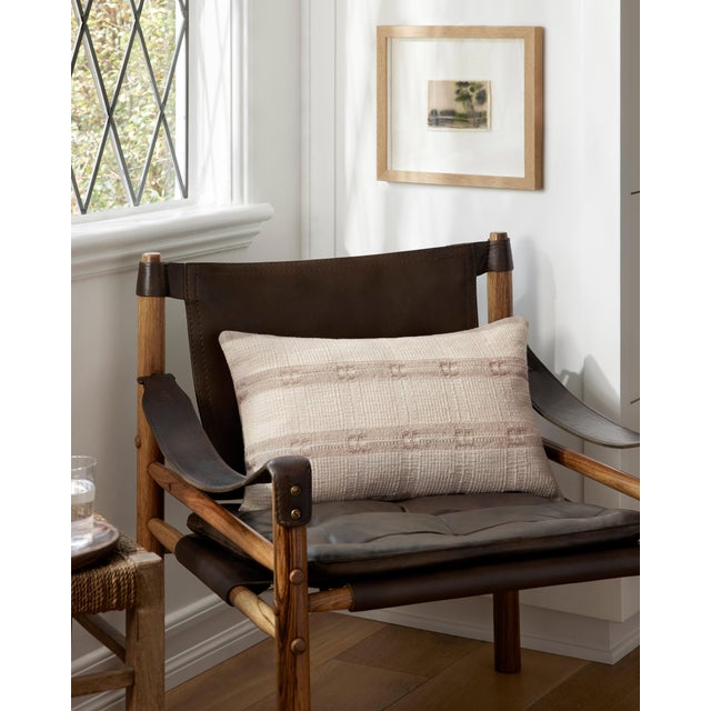 Throw pillows by Amber Lewis x Loloi take inspiration from heirloom textiles and earth-toned palettes to create an...