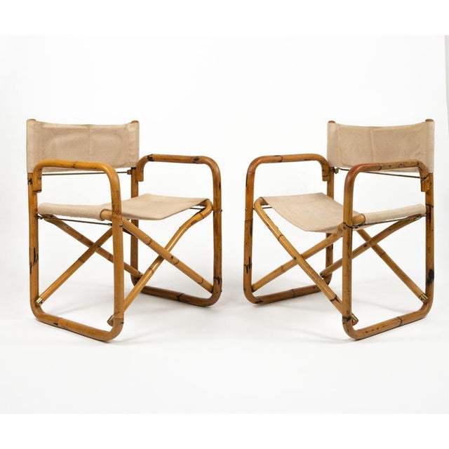 Midcentury amazing pair of folding director's chair in bamboo, texture and brass. Made in Italy in the 1960s.