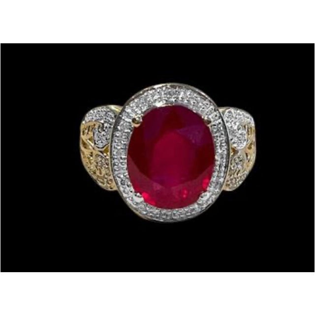 Oval 7.5 Carat Treated Ruby and 1 Carat Diamond 14 Karat Yellow Gold Ring For Sale - Image 17 of 18