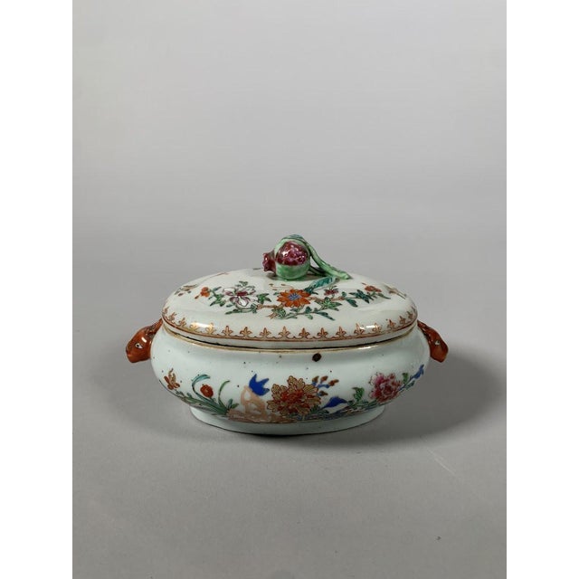 A Famille Rose enameled Chinese porcelain terrine, East India Company, 18th century , decorated with peony flowers. The...