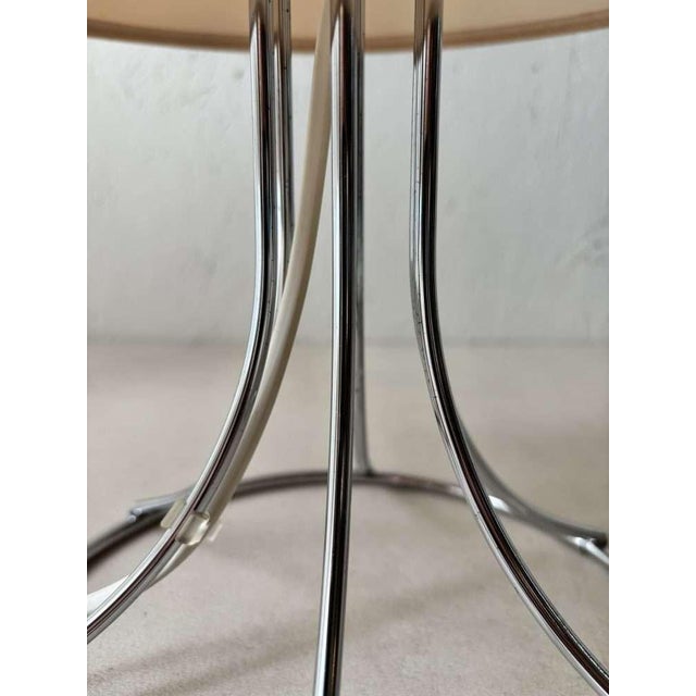 Minimalist Ackord table lamp by Bent Boysen for IKEA from the 1980s. The sculptural chrome frame and semi-transparent...