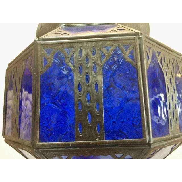 Handcrafted Moroccan Metal and Blue Glass Lantern, Octagonal Shape For Sale - Image 4 of 12