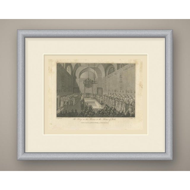 This is an original antique copper engraving, uncolored, lettered "the king on his throne in the house of lords." the long...