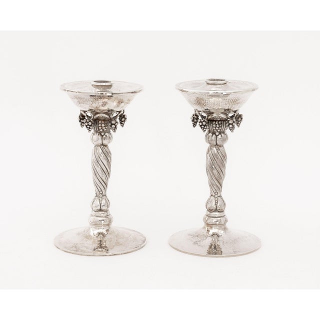 Pair of Michael Strauss Hammered Sterling Silver Grapevine Motif Candlesticks, marked to undersides. Weight: 49.76 ozt.;...