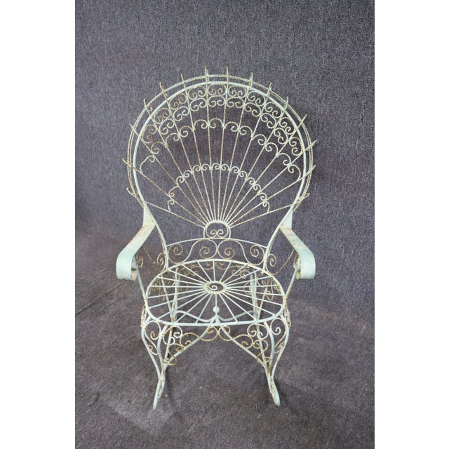 Victorian garden chair, fan/peacock style rocking chair, iron, light green, normal vintage patina to paint finish....