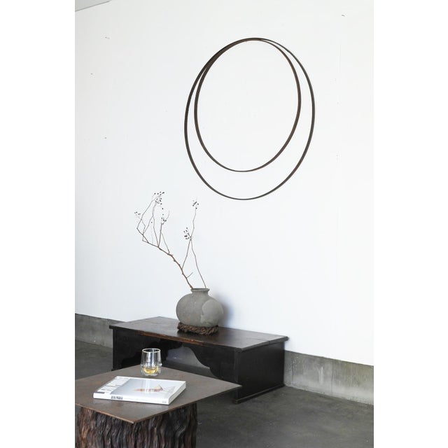 This is a pair of old iron hoops believed to have originally been attached to a wooden barrel used in Japan. The period is...