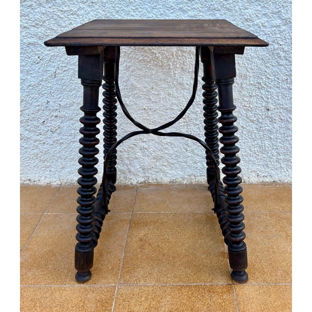 This Spanish side table dates from the early 20th century, exemplifies the Baroque Revival style that was prevalent in...