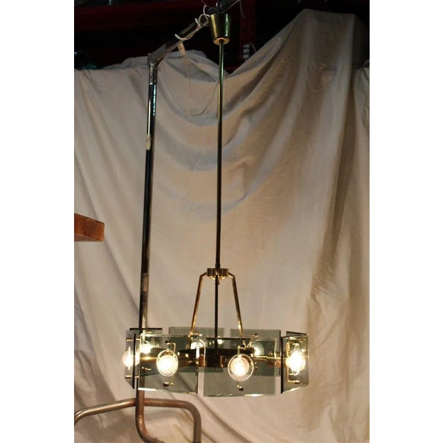 Italian Brass and Dark Green Crystals Ceiling Lamp from Gino Paroldo, 1950s, in Very Good conditions. Designed 1950 to...