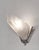 Hubert Petitot A pair of French art deco wall sconces in nickel plated bronze by Petitot. Made around 1935. They hold...