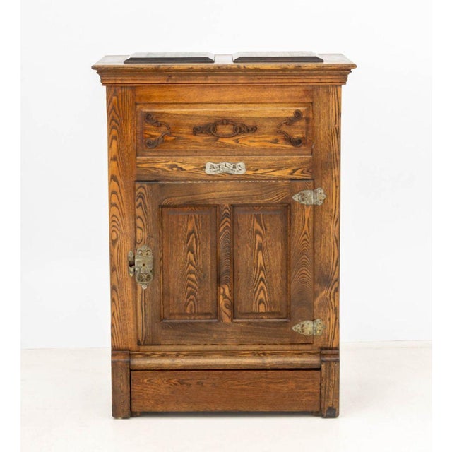 American Oak Ice Box Chest, with lift top compartment above single door compartment, "Atlas / Simpson Crawford Co. / New...