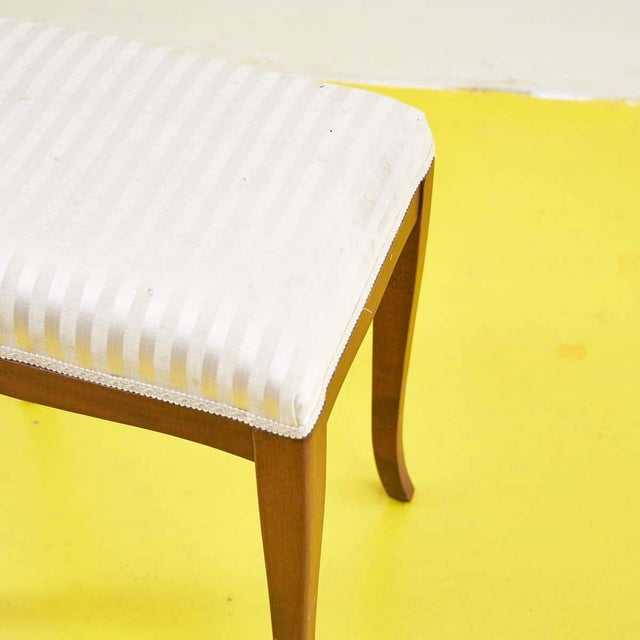 Discover this refined designer wooden stool, ideal for any space. Dating back to the modern period, this piece stands out...