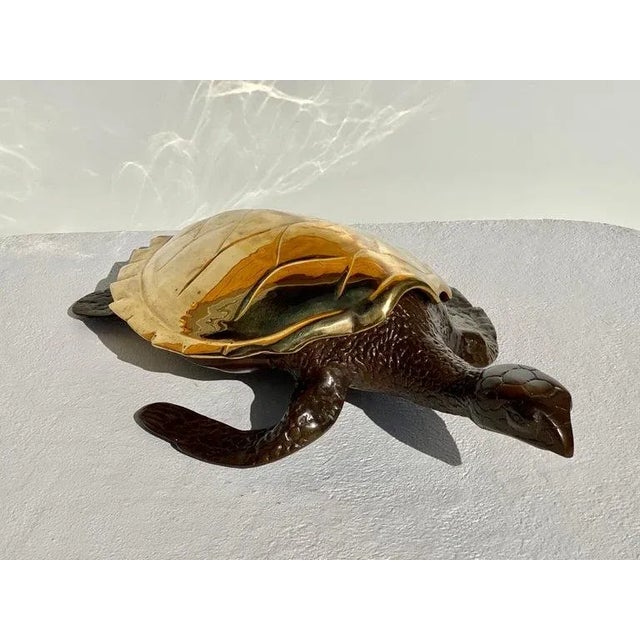 Large brass sea turtle sculpture / decorative box / catch all. Shell is polished brass and rest of body is in patinated...