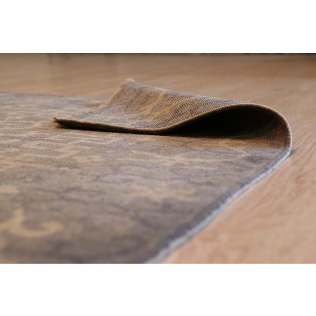 Noir Dynasty Black Handmade Ningxia Wool Rug, Country of Origin: China. This striking piece offers a sophisticated...