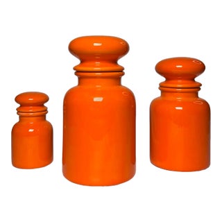 Vintage Mid Century Modern Bright Orange Apothecary Lidded Jars, Set of 3 For Sale