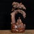 A beautifully hand-carved Boxwood sculpture featuring a seated Buddhist monk or Arhat in a meditative pose with hands...