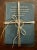 Three Christian Science books wrapped in twine rope. Dark blue with gold lettering. Published 1919, 1934 & 1936. Two are...