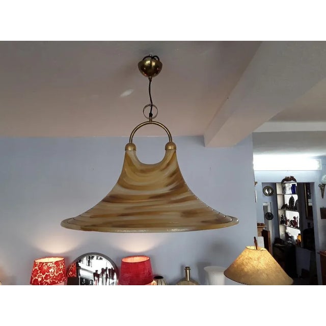 This is a large funnel-shaped ceiling lamp with two sockets. The height ranges from 60 - 120cm. This piece has an...