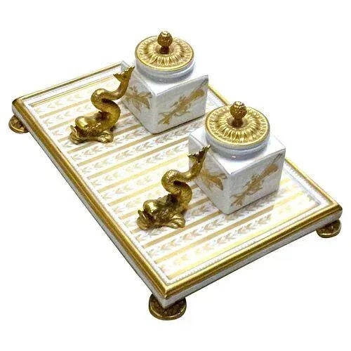 Vintage porpoise and leaf porcelain double inkwell with gilt petal lids and bow and arrow accents. Striped gilt painted...