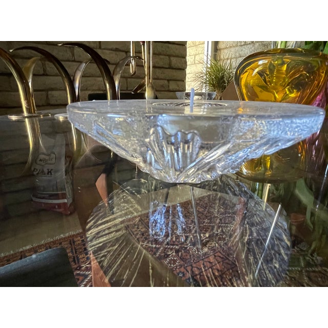 This is really a beautiful piece from the famous Swedish company Orrefors. Piece evokes a feel of winter ice crystals and...