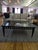 Contemporary Kravet cocktail table featuring a sleek rectangular silhouette with decorative cutout apron detailing and...