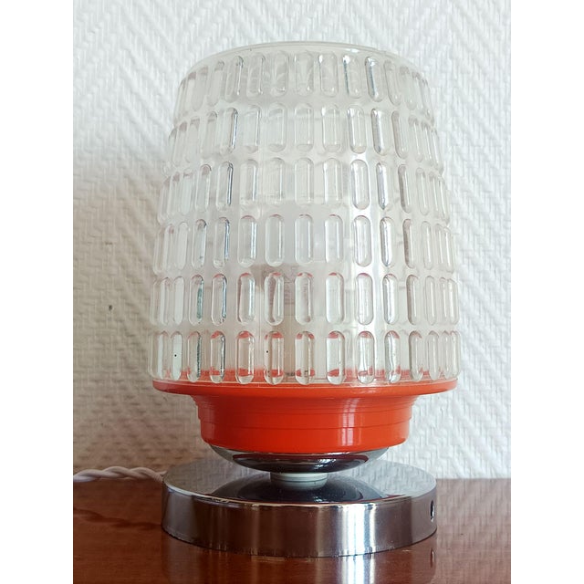 Small vintage space-age style table lamp/nightlight, circa 1970. It features a clear, bubble-patterned plastic globe with...