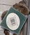 The Vintage Hosley 9.5" Brass Urn with Lid is a medium-sized decorative collectible piece that is perfect for all...