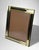 Elegant Italian picture frame crafted in finely worked brass and mirror-polished steel, with a black velvet-covered back....