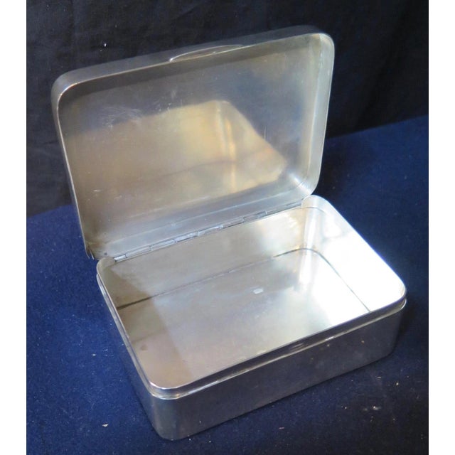 This vintage American Art Deco sterling silver smoking set includes a cigarette case & cigarette box. The cigarette case...