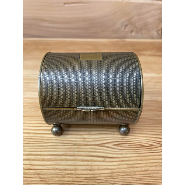 Charming antique barrel-form trinket box, dating to the late 19th / early 20th century. Crafted from brass with a fine...