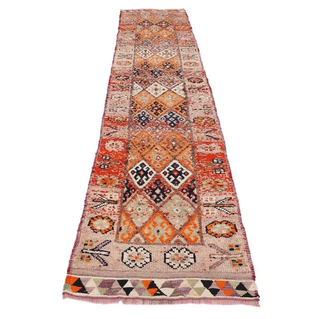 Handknotted vintage decorative Herki runner from Northern Iraq. Approximately 50-60 years old. In very good condition.