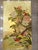 A luxurious hand painted gold leaf wallpaper featuring an elegant oriental composition of colorful phoenix birds, blooming...