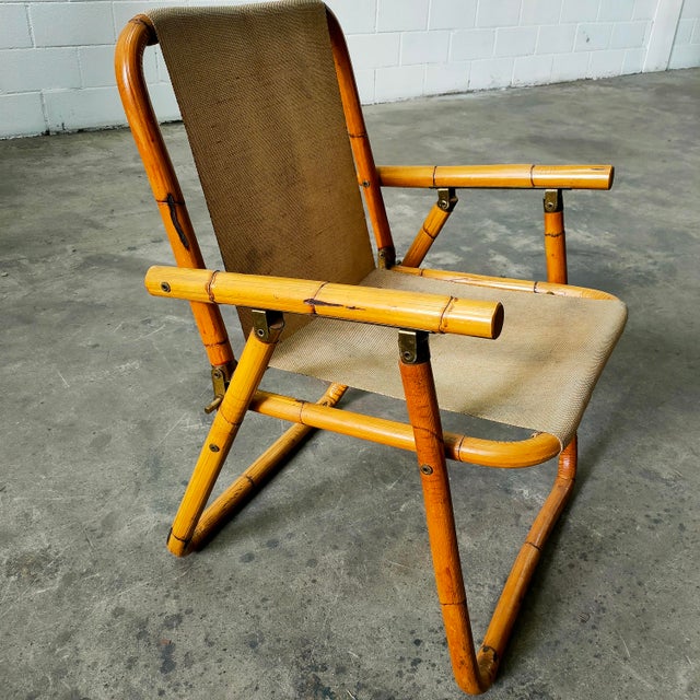 Folding chair manufactured by Dal Vera in Italy, 1960s. The entire frame is made of genuine bamboo, with original burlap...