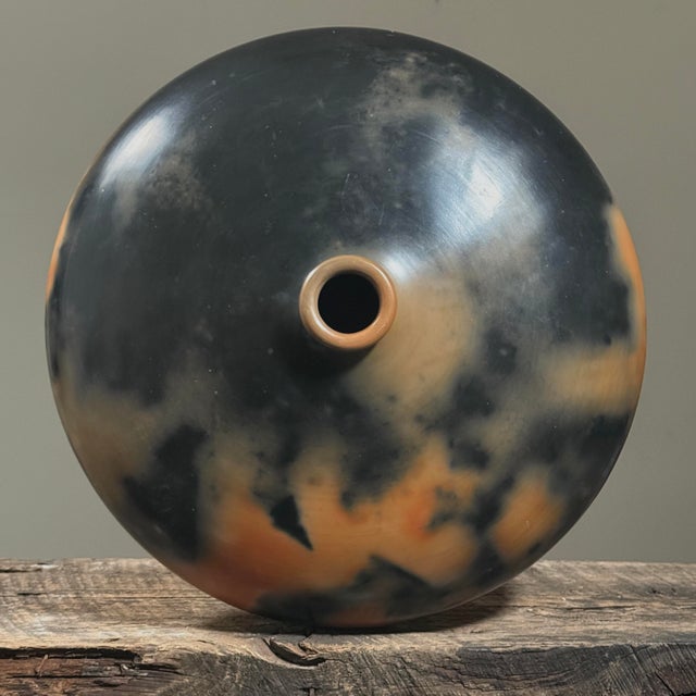 Monumental vintage organic modern seed pot, hand turned and burnished with striking orange and black smoke patterning....