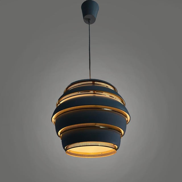 Finnish modern chandelier Beehive by Alvar Aalto for Valaisinpaja Oy, 1970s Chandelier model Beehive or A 331 with a round...