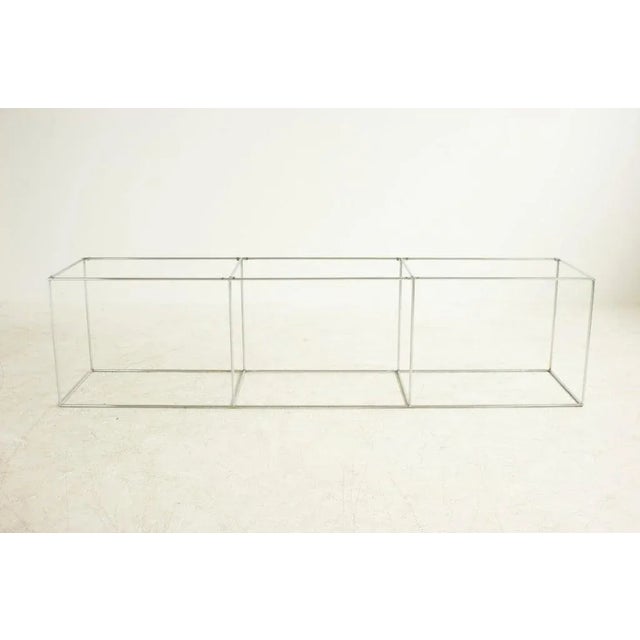 Horizontal tubular frame, sturdy to hold 3 Carrara marble slabs, sofa table or wall unit.