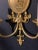 A pair of circa 1920’s gilt bronze neoclassic style sconces