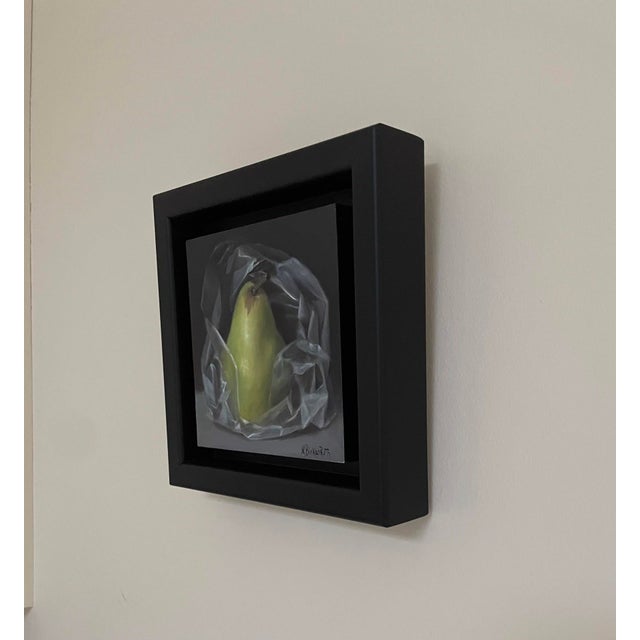 Contemporary Pear Wrapped in Plastic by Kelly Birkenruth | Oil on Panel of a pear in plastic wrap For Sale - Image 3 of 5